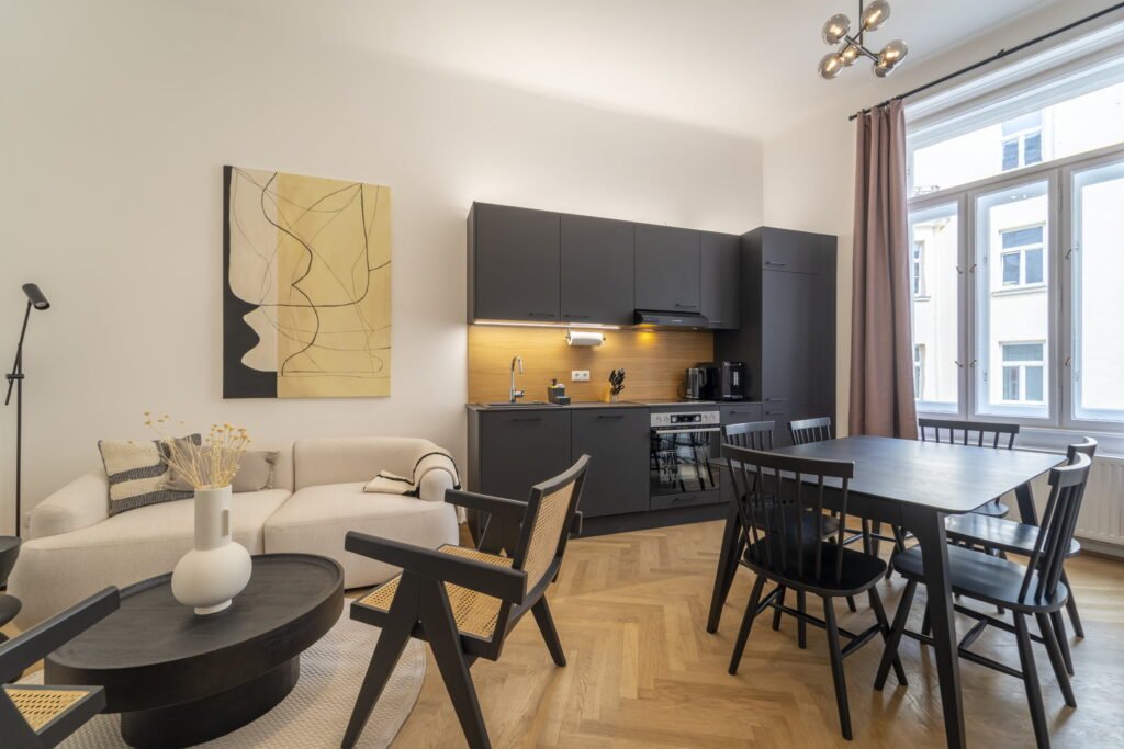 Wohnbereich und Küche des Apartments in der Hirschengasse